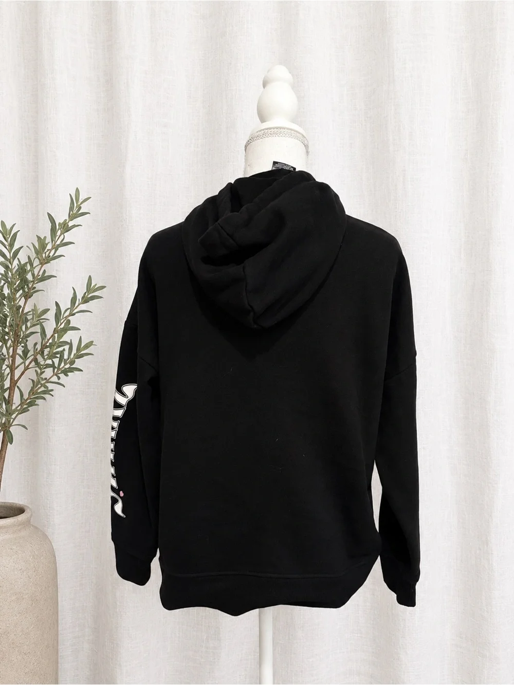 Black Crewneck Hoodie Sweater with Skull & Web Graphic and Pink Accents - Picture 2 of 2